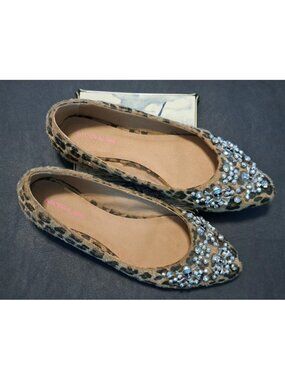Material Girl Faux Cheetah Fur Flats with Skull Beads Embellishments.
